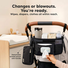 Load image into Gallery viewer, Changes or blowouts. You're ready - Wipes, diapers, clothes all within reach. (Detachable wristlet pouch with handle)