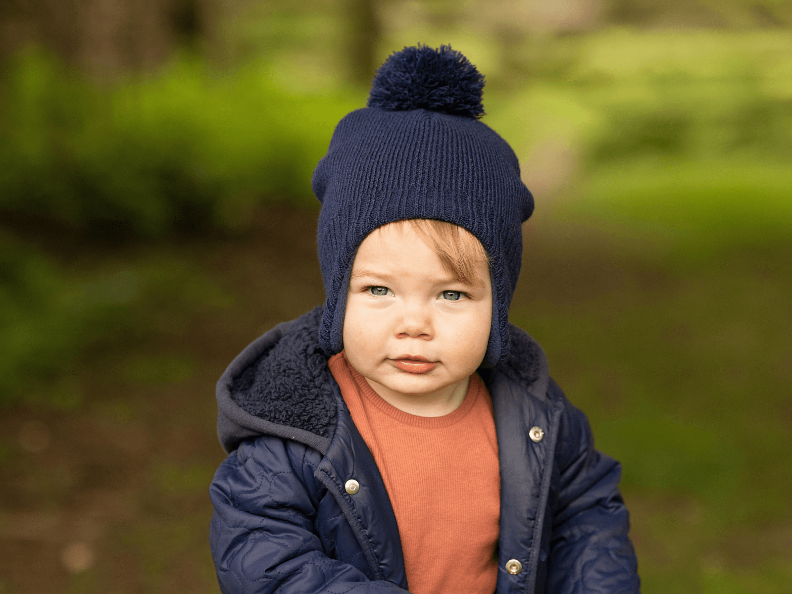 Boy deals baby beanies