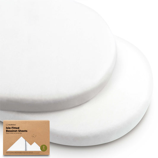 Two plain white oval bassinet fitted sheets stacked together with product packaging.