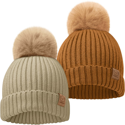 Two cozy knitted baby beanies with soft pom-pom tops
 28143460417722