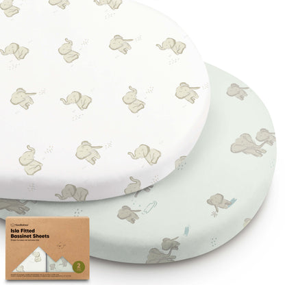 Two Isla fitted bassinet sheets with elephant print, shown with packaging. 29635949461690