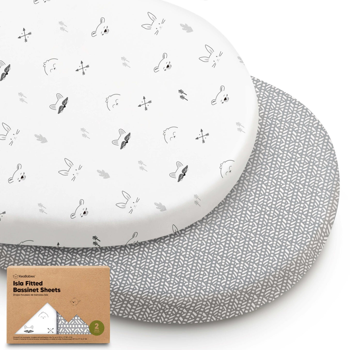 Two Isla fitted bassinet sheets in monochrome animal and geometric prints, stacked with packaging 29828899766458