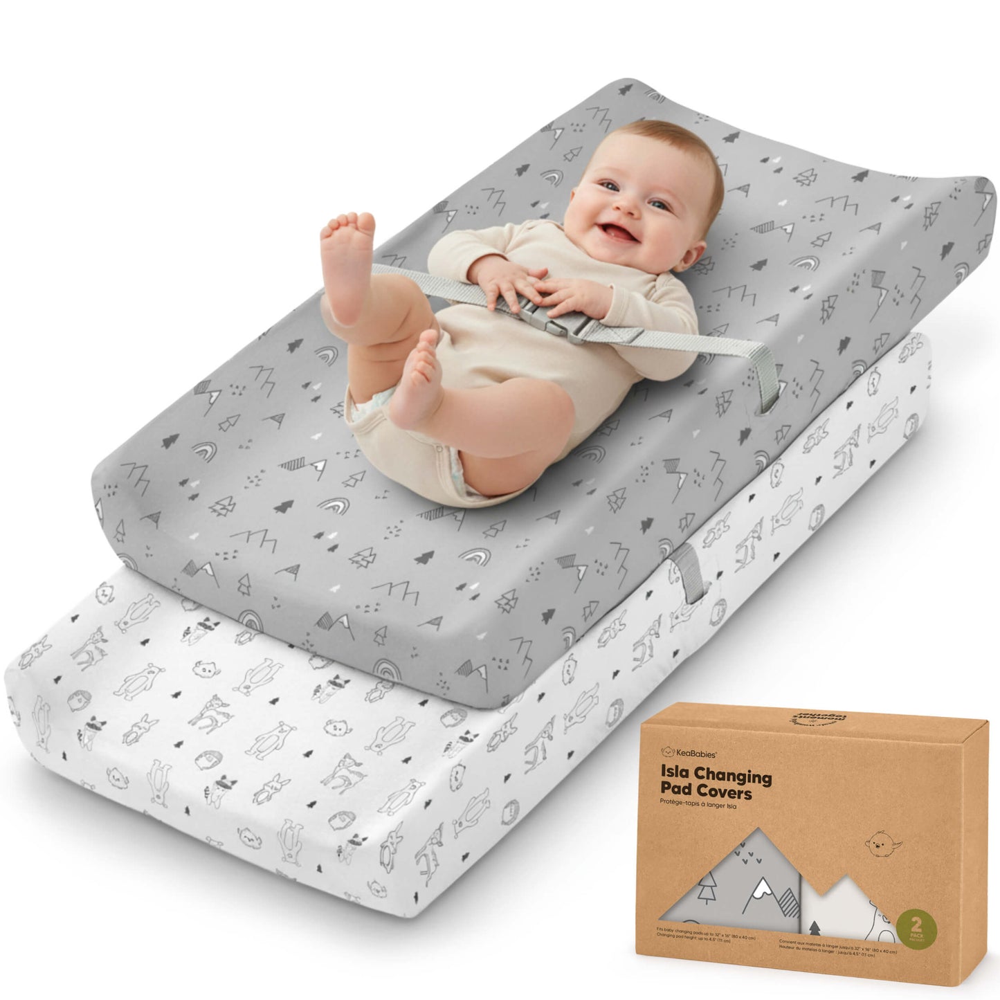 Isla changing pad covers, 2-pack, shown with a baby lying on top of the padded changing mat. 31252301611194
