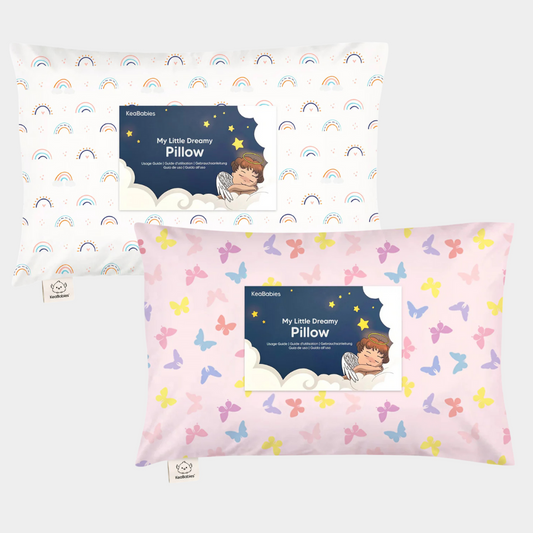 A set of two colorful toddler pillows with playful prints designed for comfort and everyday use.
