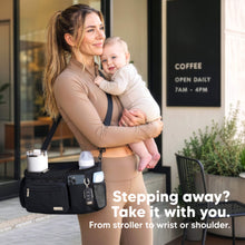 Load image into Gallery viewer, Stepping away? Take it with you. - From stroller to wrist or shoulder.
