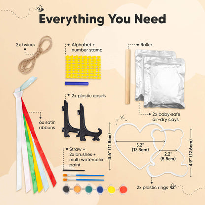 Everything You Need: 2x twines, alphabet + number stamp, roller, 2x baby-safe air-dry clays, 2x plastic easels, 6x satin ribbons, watercolor paint set + 2x brushes + straw, 2x plastic rings (heart: 5.2" / 13.3cm, bear: 4.9" / 12.6cm). 30514294849722