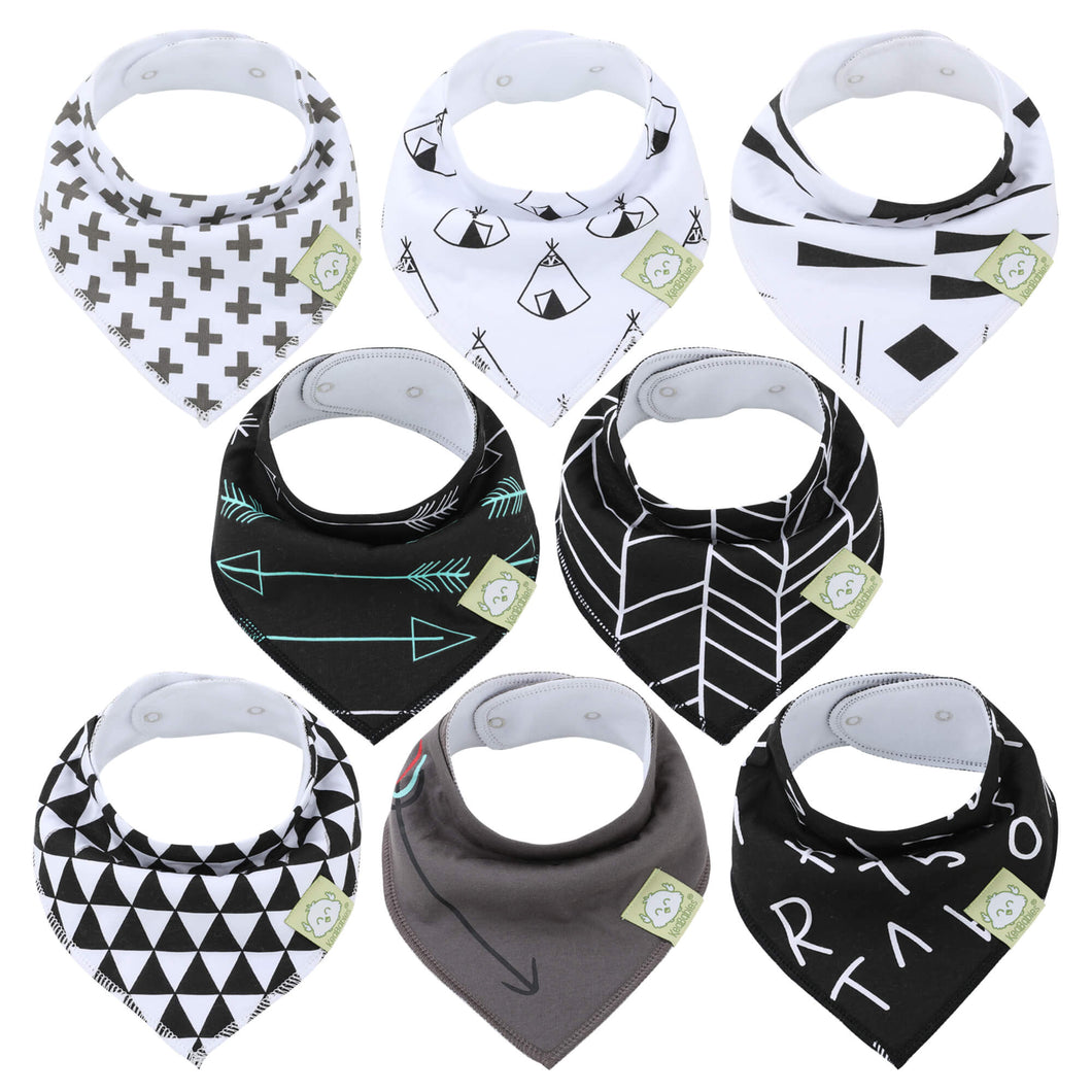 a bunch of white and black glasses on a white surface 